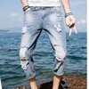 Jeans in denim da uomo stile Hong Kong Studente autunnale Allentato stile coreano Pantaloni alla caviglia con foro di tendenza Pantaloni a matita per adolescenti tutto fiammifero