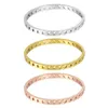 2022 Gold rostfritt stål Kvinna armband Bangle Hollow Out Luxury Wedding Party Band Wrist Band Jewelery Christmas Gifts Kvinnliga trendiga par Girls Hands manschett