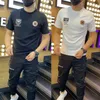 2022 Summer New Fashion Men's Men's T-shirts Back Trend Padrão personalizado Bordado Design estilo hip-hop Manga curta Round Roul