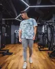 Fitness tişört yaz kısa kollu erkek kas kamuflaj pamuk gevşek spor büyük boy crewneck üst