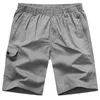 Pantalones cortos para hombres masculino algodón suelto 2022 cintura elástica de verano para hombre sólido diseño clásico calzones casual playa pantalones cortos tallas grandes