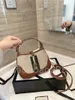 Designer de luxe en cuir véritable Hobo Hasp sacs à bandoulière sous les bras sacs à main pour femmes célèbre marque femmes Double lettres 20 cm petits sacs à main Axilla sac à main portefeuille sac