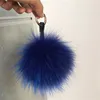 럭셔리 리얼 모피 열쇠 고리 Pompom 열쇠 고리 15cm 솜털 너구리 공 골드 Pompon 열쇠 고리 참 가방 펜던트 GiftsKeychains Fier22