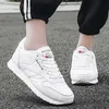 Nya mode män casual skor kvinnor andas unisex tränare platt sneakers zapatos de mujer tenis masculino