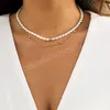 Elegante collana a catena di perle multistrato per collare da donna Dichiarazione di moda gioielli collana di perline bianche minimalista