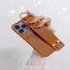 luxury design wrist strap phone case For iPhone 14 14pro 13 promax 13 12PRO 12 11 11PRO MAX XSMAX XR X female leather personality 9437840