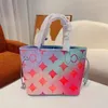 Dames luxurys ontwerpers bakken onthego boodschappentassen topkwaliteit game op handtas gradiënt shouder crossbody tas echte lederen dames handtassen 33 cm