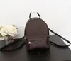 Mini de couro de moda de alta qualidade Mini tamanho feminino Bolsa infantil Backpacks Mochilas Estilo Bolsa de viagem de mochila de mochila de primavera 5 cores