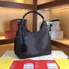 Designer Handbags Totes Bag Purse Mahina Original Taurillon Genuine Leather Pm Gm Vintage Luxury Carmel Hobo Crossbody Shoulder Bags