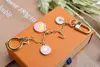 Luxurys Designers Keychain Classic Brand Key Buckle Flower Letter Key Chain Bag Ring Handmade Keychains High Quality Men Women Bags Pendant Multiple Colour