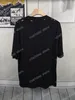 22SS Hommes Femmes Designers T-shirts Tee Paris Détruit Lettre de peinture Tie Dye Lettre Coton à manches courtes Col ras du cou Streetwear Noir Gris Xinxinbuy XS-L