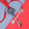 Keychains 2022 도매 크리에이티브 크리스마스 키 체인 눈송이 리본 마법 키 산타 클로스 트리 장식 선물 선물 enek22