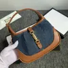 أكياس الدنيم الكلاسيكية أكياس للنساء crossbody الصدر أزياء جلدية حقيقية قماش underarm مصمم حقيبة السيدات حقائب اليد حقائب اليد المحافظ الحجم: 19 * 13 * 3 سنتيمتر