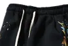 Svarta byxor svettbyxor män kvinnor målade högkvalitativa elastiska midja unisex byxa joggar dragskovaror
