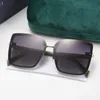 Lunettes de soleil à lettres européennes et américaines pour femme grand cadre montrent le filet cool du couple mince rouge même style ins coupe-vent personnalité hommes