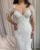 Abito da sposa vintage in pizzo a sirena 2022 a maniche lunghe con collo gioiello Abiti sexy senza schienale Boho Abiti da sposa Robe De Mariage Vestido Novia