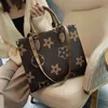 Sac à main de marque de luxe pour femmes, vente en gros, nouveau Shopping Portable, grande capacité asymétrique, fourre-tout tendance, 2022