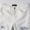 ホワイトジーンズの男性パッチスリムフィット11高品質バイカーデニムパンツヒップホップズボンサイズ28-40