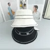 Designer di cappelli a secchio per donne Waffle Design Cotton Brime Cappelli con logo di lusso Cappelli a cilindri formali