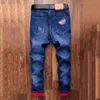 Джинсы для мужчин модные разорванные джинсовые брюки байкер высококачественный мужской рисунок. Повседневные дизайнерские брюки хип -хоп кальки 220606