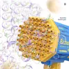 69 hoyos Burbujas de burbujas eléctricas Burbujas Burbujas Forma de ametralladora Soplador automático con juguetes ligeros para niños Regalo de niños para niños Y220725
