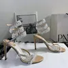 Sandali da donna di alta qualità Designer di lusso Ciondolo di luce di cristallo Anello del piede intrecciato Scarpe eleganti con tacco alto Fascia stretta Strass 10CM Sandalo da sera con tacco