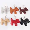 Söt hund pu läder nyckelring mode kvinnor handväska pendel charm väska tillbehör 6 färger