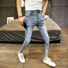 Jeans da uomo personalità maschile margherita ricamata denim stampato pantaloni slim coreani da uomo alla moda 2022 estate ritagliata matita per adolescenti