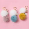 Peluche finta pelliccia doppio pompon portachiavi per le donne ragazze imitazione perle portachiavi portachiavi borsa per auto ciondolo charms accessori