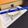Estilo de moda pulseiras mulheres pulseira designer 18k banhado a ouro pulseira atacado pulseira de aço inoxidável manguito moda jóias acessórios s109