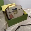 Padlock small bamboo shoulder bag Shiny gold-toned hardware Detachable strap Chain Flap closure Handbag