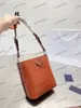 Panier Bucket Bag Spazzolato Patent Leather Designer Women Drawstring Shoulder Bag Triangle Logo Luxury Nylon Brand Crossbody Tote Purse