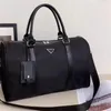 Bolsos de compras de moda Bolso de lujo Bolso de lona de nylon Hombres Mujeres Bolso Diseñador hombro Tote Calidad superior Grandes bolsos de playa lujos viajes Crossbody Monederos Negro