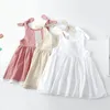 أنماط Ins Styles Girl Dress Kids Summer Cotton Solid Color Sumpender with Lace Design Princess Dresses Elegant Dresses M4178