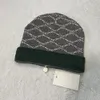 24SSニットハットビーニーキャップデザイナーマンファッションウーマン冬の帽子のためのスカルキャップ4カラー最高品質