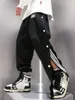 Erkek pantolon Japon moda erkekler hip hop ince bahar yaz düğmesi her iki yan pantolon benzersiz tasarım genç gevşek düz pantolon