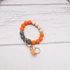 Commerce extérieur nouveau bracelet de perles de silicone de qualité alimentaire porte-clés pendentif gland de velours coréen porte-clés en gros multicolore en option