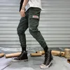 Pantaloni da uomo Uomo che vende tuta mimetica Tendenza moda Strada Outdoor Tempo libero Sport Allenamento Pantaloni da jogging Abbigliamento da uomoUomo