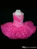 Abiti da bambina con fiori in organza rosa giallo senza schienale in organza con lacci sul retro Little Rosie Ruffles Glitz Abiti da spettacolo di alta qualità per bambini