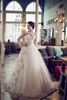 Jurken Designer Arabisch Dubai Lace Wedding Jurken Moslim lange mouwen een lijn trouwjurk Bateau bloemen verfraaiing bescheiden bruids dres