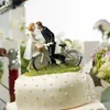 New Wedding Cake Toppers Bicycle Kissing Bride and Groom Decoration CupCake Topper Resign Figurine Craft Souvenir Wedding Favors1991108