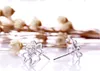 2015 الأزياء والمجوهرات 925 earrrings فضة مع الأبيض الكريستال الكلاسيكية عصا القرط التسلق زهرة شكل للنساء