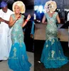 Abiti da sposa tradizionali africani Scollo a V blu turchese Appliques dorati Tulle Sweep Train Nigeria Abiti da sposa abito da sera