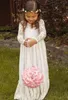 Şeffaf Dantel Boyun Çiçek Kız Elbise Uzun Kollu Kat Uzunluk Ruffles Fildişi Flowergirl Elbiseler Çocuklar için Bow Kanat Bohemian Gelinlikler