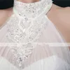 2024 Bröllopsklänningar Nya heta mode gratis frakt elegant bollklänning elfenben golvlängd applikationer pärlor halter tyll brud klänningar