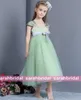2015 Mały Kwiat Dziewczyny Dresses Długość Herbaty Mint Zielony Tulle Empire Bow Bridal Party Suknie Czapki Rękawy Do Wesela Dzieci Formalna Sprzedaż Tanie