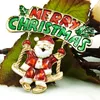 Marca Nueva Navidad Broches Pins chapado en oro esmalte Santa Claus Swing broches para hombres paños decoración joyas
