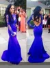 Royal Blue Lace Prom Klänningar Slim Monterade Sheer Långärmade Kvällar Sexiga Backlösa Mermaid Öppna Baklösa Formella Party Klänningar