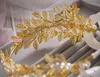 في المخزون 2015 الذهب الزيتون فرع الزفاف خوذة الشعر الراين التيجان التيجان اكسسوارات للشعر