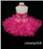 Abiti da bambina con fiori in organza rosa giallo senza schienale in organza con lacci sul retro Little Rosie Ruffles Glitz Abiti da spettacolo di alta qualità per bambini